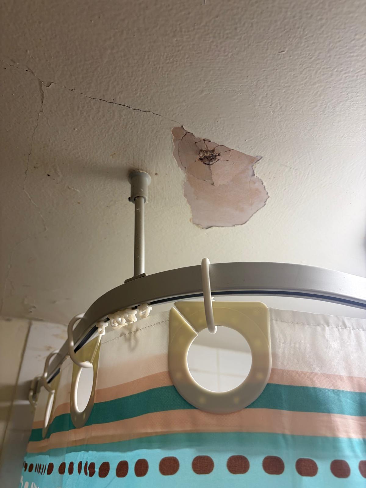 Damp and mould on bedroom wall in Grimsby rental property